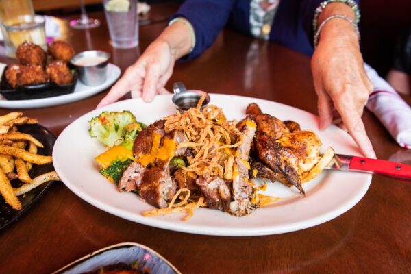 Sharps Roasthouse Combo Platter featuring BBQ ribs and Chicken, broccoli. A very appetizing looking dish