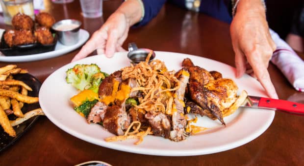 Sharps Roasthouse Combo Platter featuring BBQ ribs and Chicken, broccoli. A very appetizing looking dish