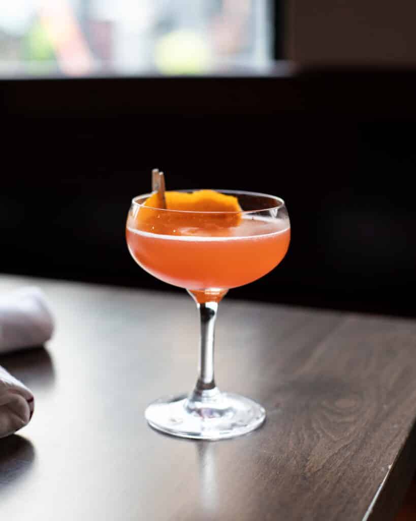 A balance of Bar Boss Bourbon™, Amaro Nonino Quintessentia, Aperol and lemon